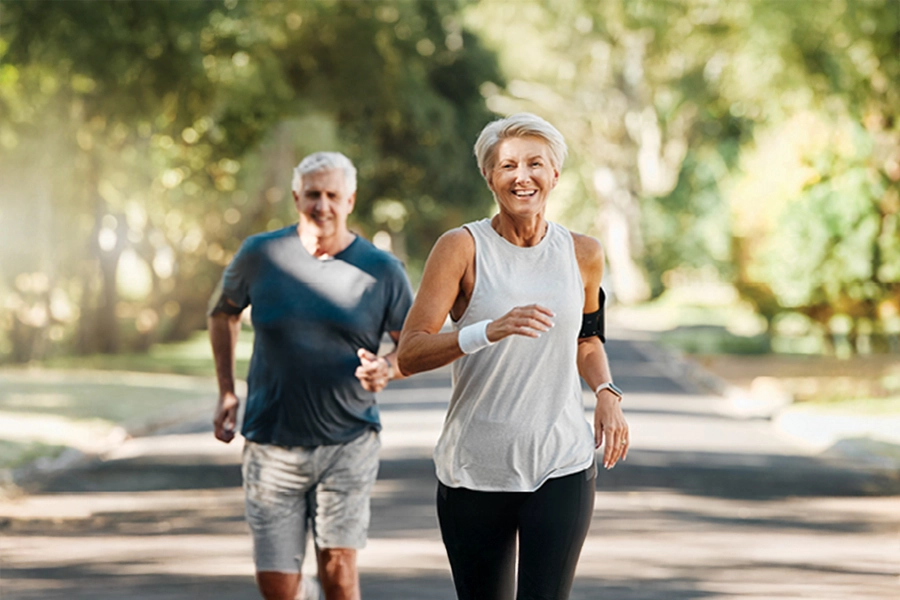Couple jogging on path